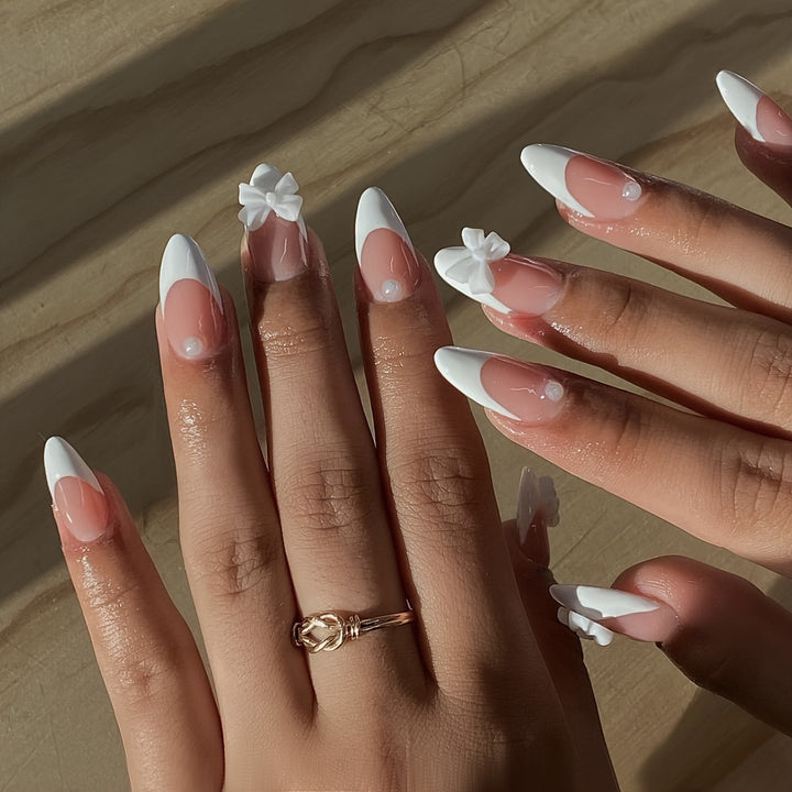 Acrylic nail set with elegant tips and floral accents Kalsten