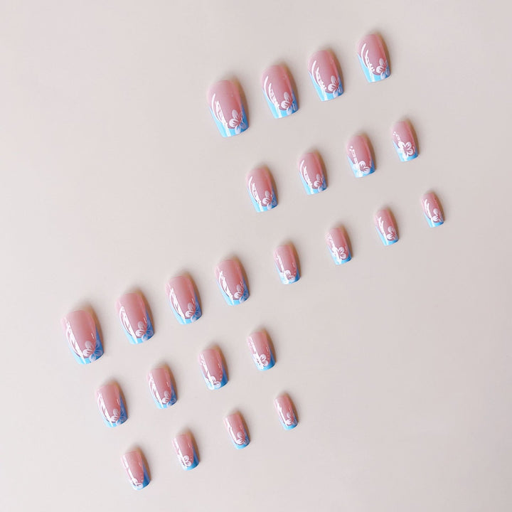 Acrylic nail set with floral designs and elegant tips Kalsten