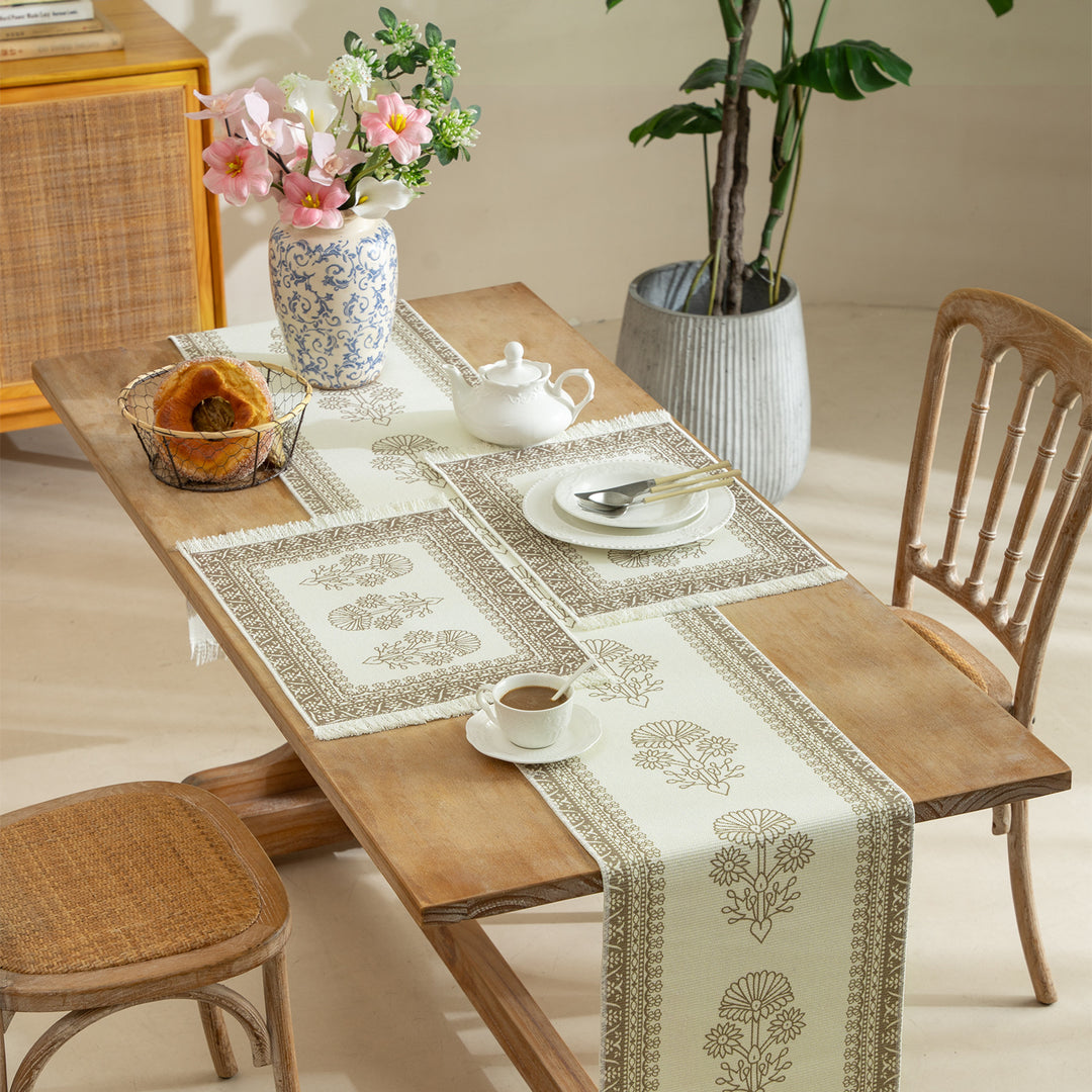 Vintage-inspired woven table runner with floral border and fringes Kalsten