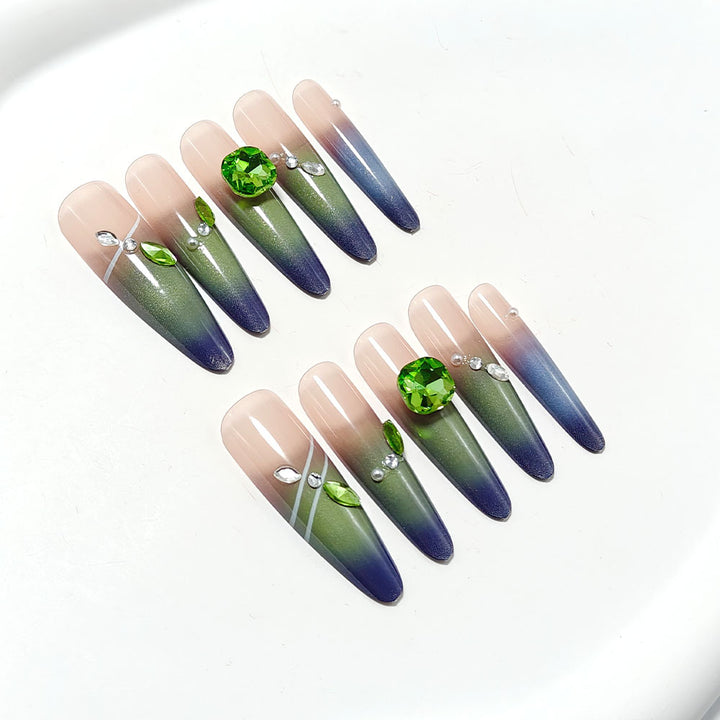 Artifical nails with elegant ombre design and sparkling accents Kalsten