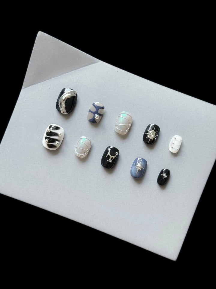 Artistic Press-On Nail Set with Cosmic Themes