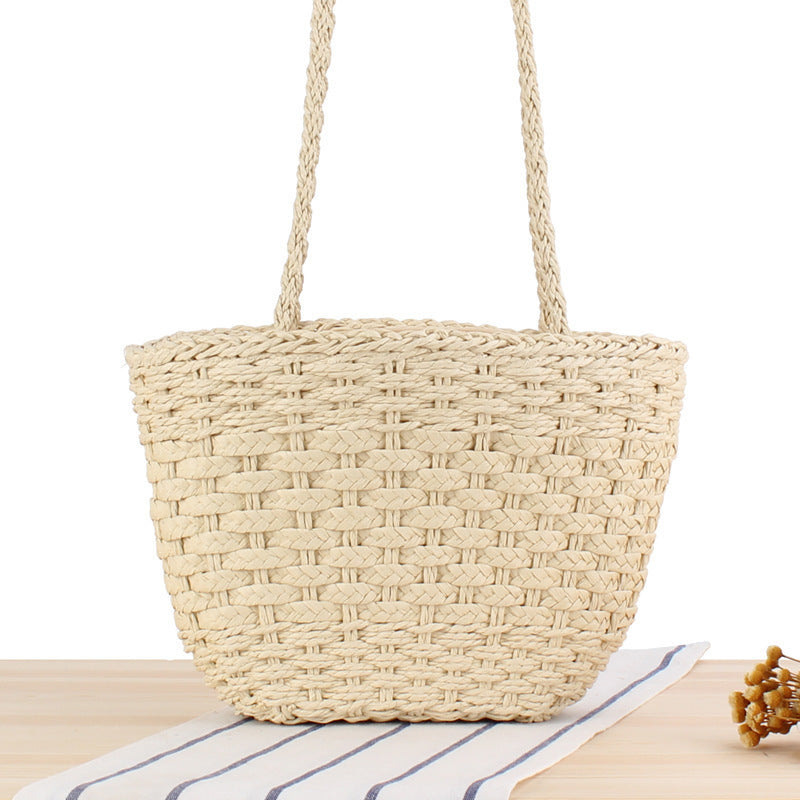 Braided handbag made of natural raffia with robust carrying straps Kalsten