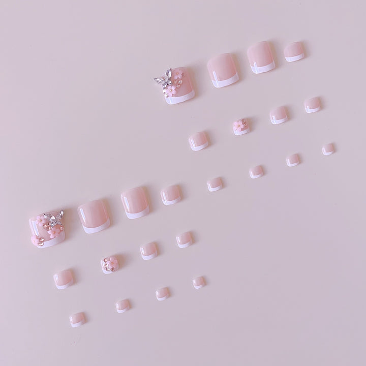 Acrylic nail set with elegant 3D flowers and glitter accents Kalsten