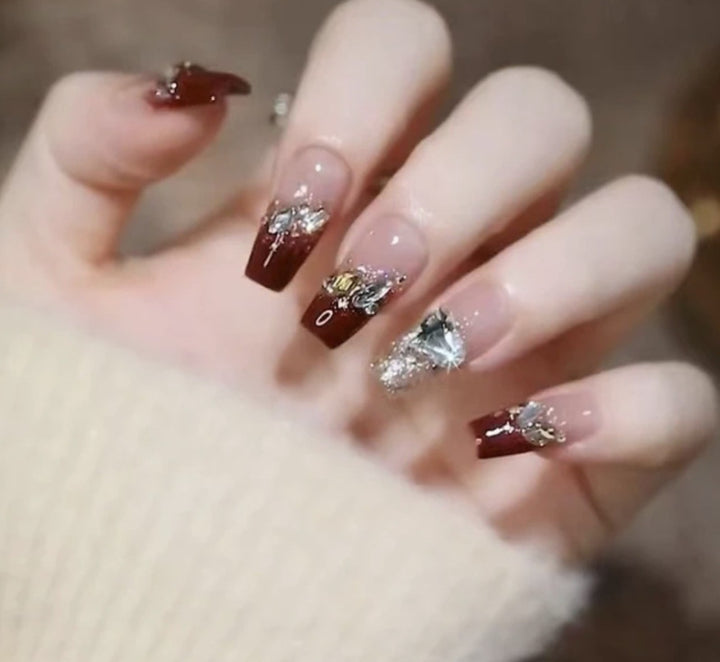Artistic Nail Art with Glitter and Flower Applications Kalsten