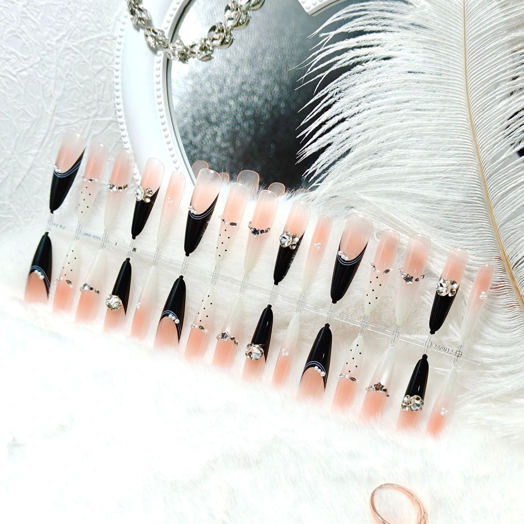 Glamorous artificial nails with glitter accents Kalsten