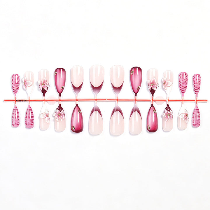 Artificial nail set with floral accents and ombre effect Kalsten