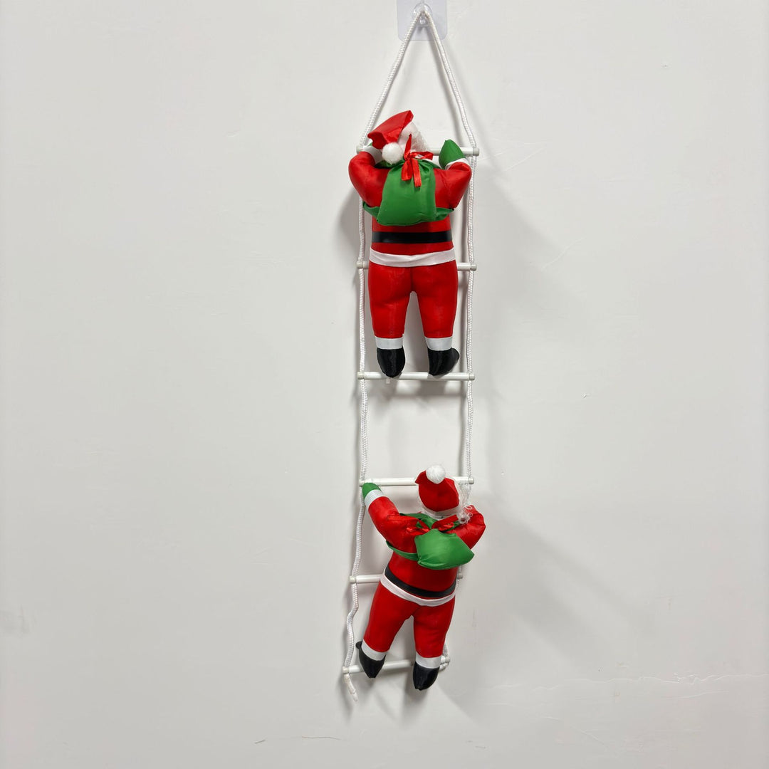 Decorative Santa Claus figures with ladder