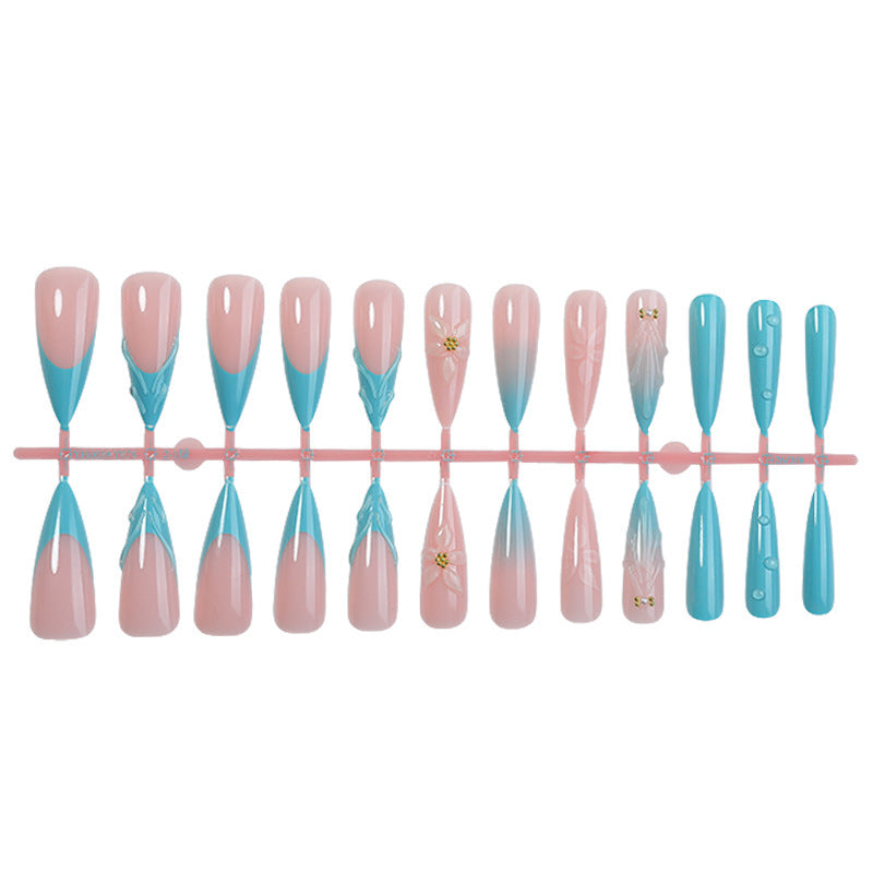 Nail set with filigree designs Kalsten