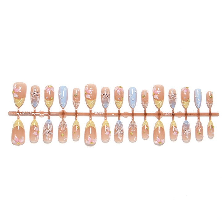 Artificial nails with floral motifs and glitter details Kalsten
