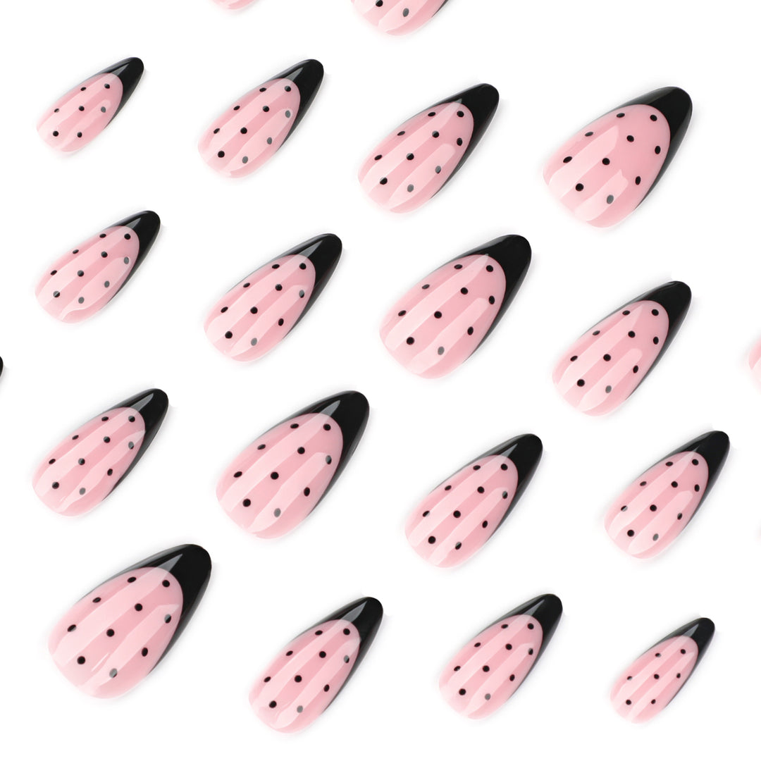 Artistic stiletto nails with black dot pattern Kalsten