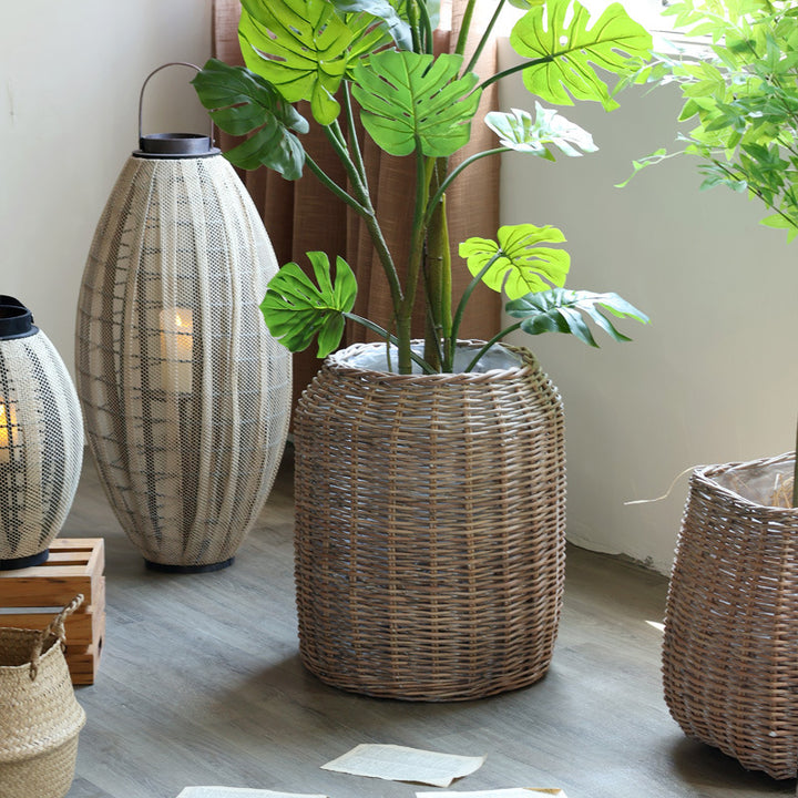Stylish laundry basket made of braided natural material Kalsten