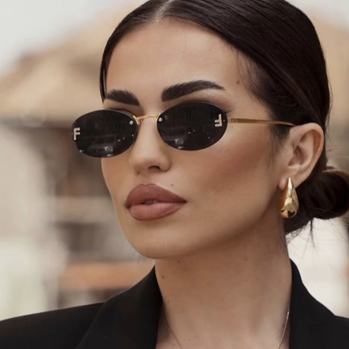Women's fashionable sunglasses with elegant, round lenses and delicate metal frame Kalsten