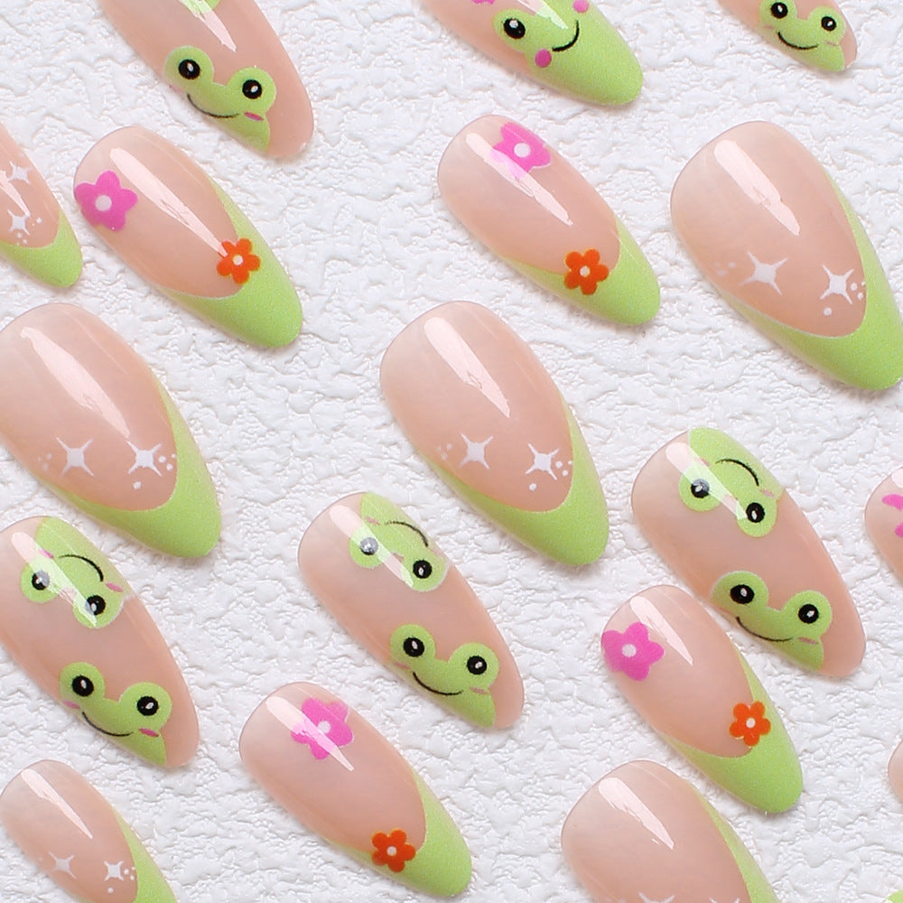 Artificial nail set with creative frog designs and playful accents Kalsten