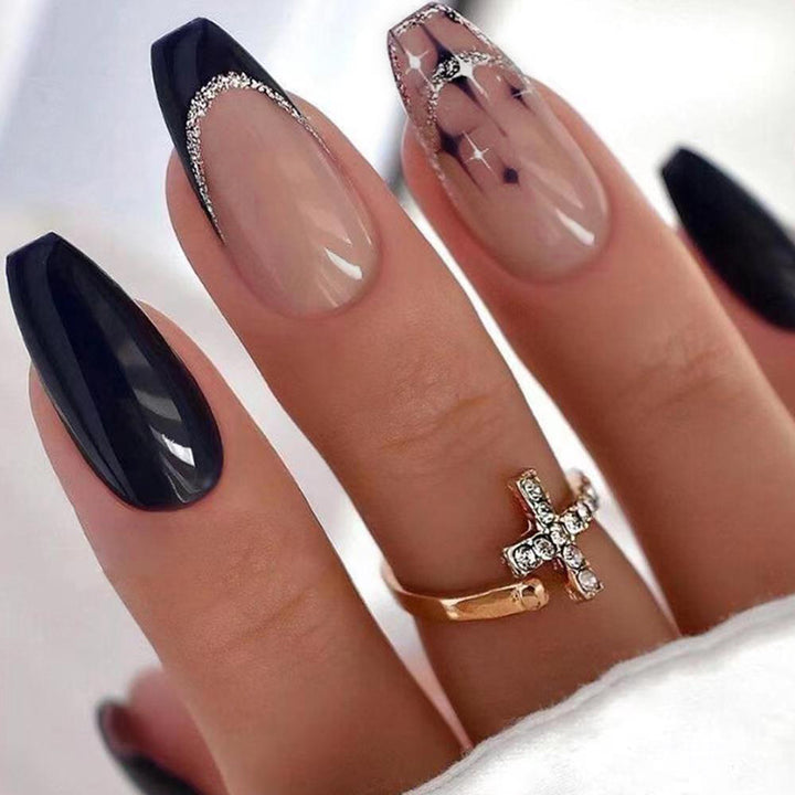 Elegant and artistic stiletto artificial nails with glitter embellishments Kalsten