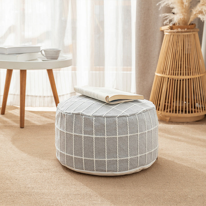 Beef padded seat pouf with embroidered check pattern and cotton cover