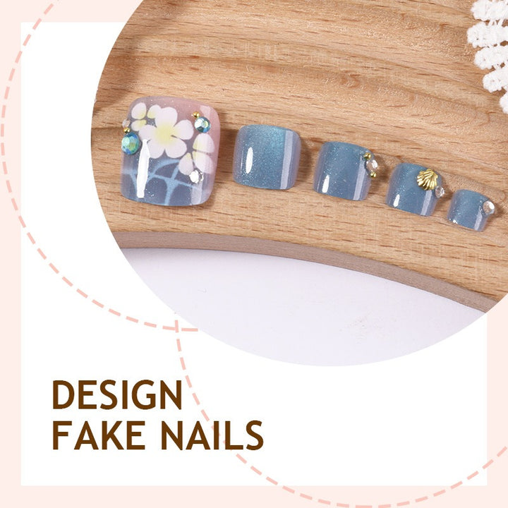 Artificial nail set with floral appliqués and glitter effects Kalsten