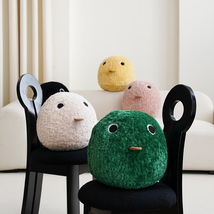 Round plush floor seat cushion with face application and shape-stable filling