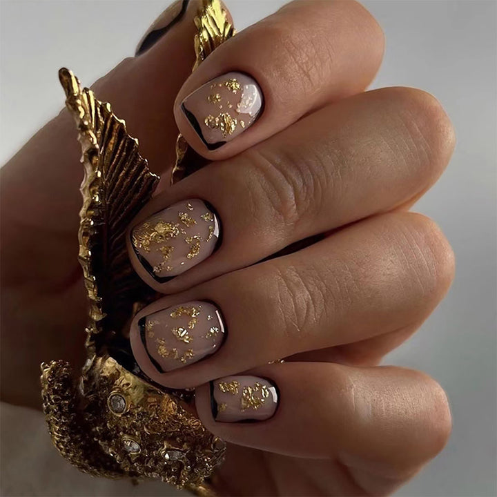 Artificial nail set with delicate gold accents and elegant finish Kalsten