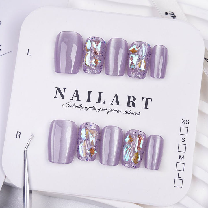 Acrylic nails with glitter accents and modern designs Kalsten