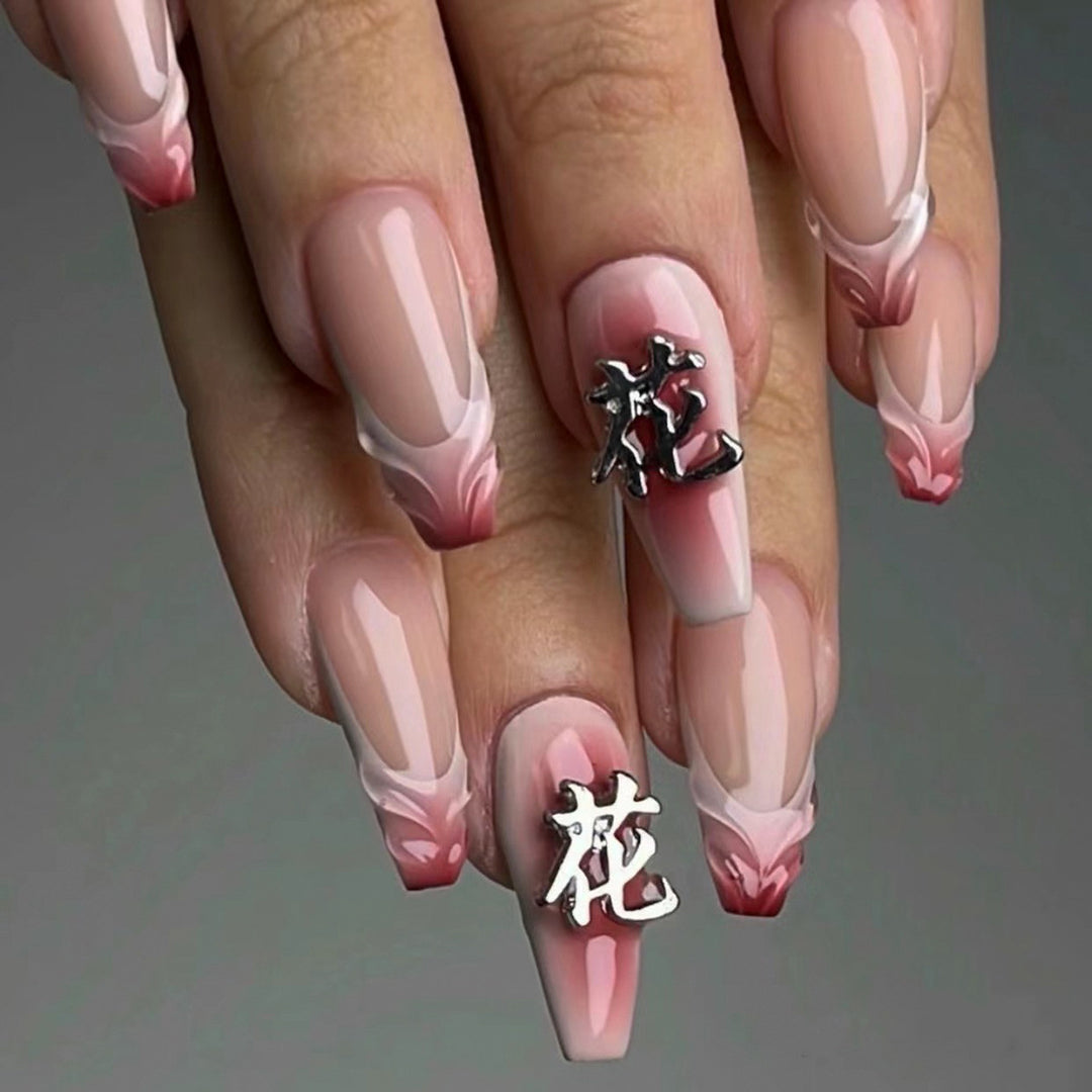 Artful stiletto nails with floral accents and 3D details Kalsten