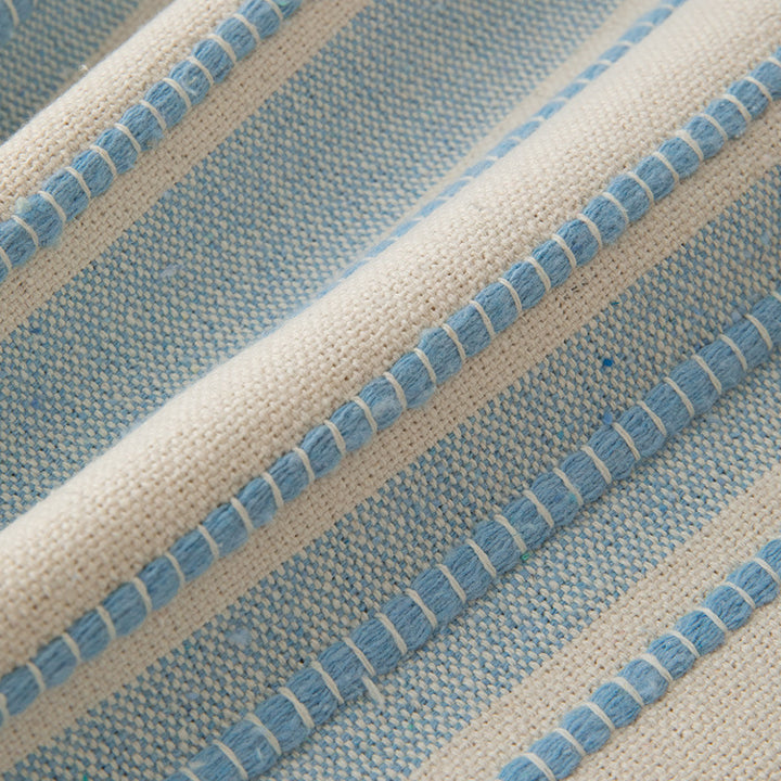 Square cushion cover made of hand-woven cotton blend with decorative fringe trim Kalsten