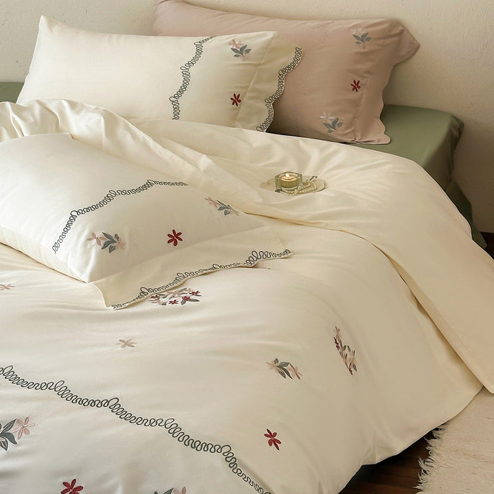 Luxurious embroidered satin bedding set with pillowcase and neck roll