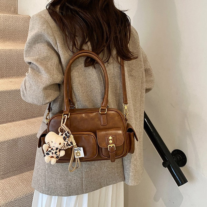 Elegant Handbag with Playful Charms and Multiple Compartments Kalsten