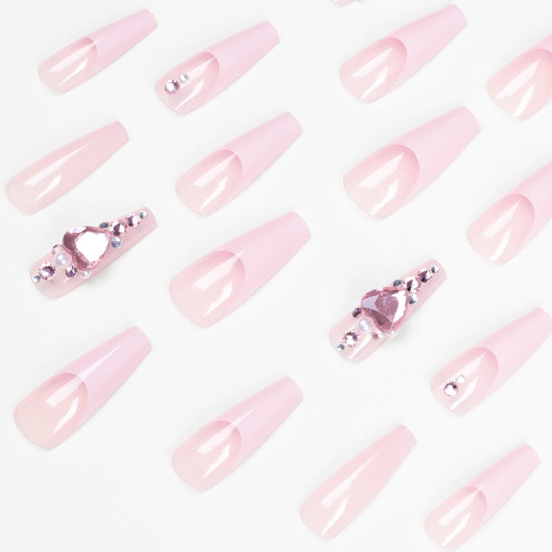 Glamorous nail extensions with glitter embellishments Kalsten