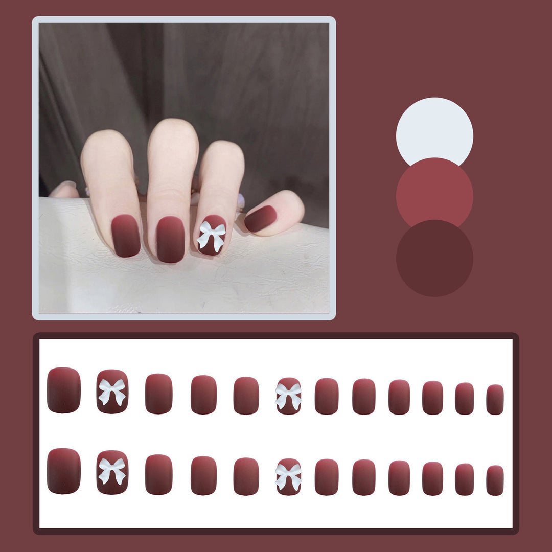 Artificial nails with elegant bow motifs Kalsten