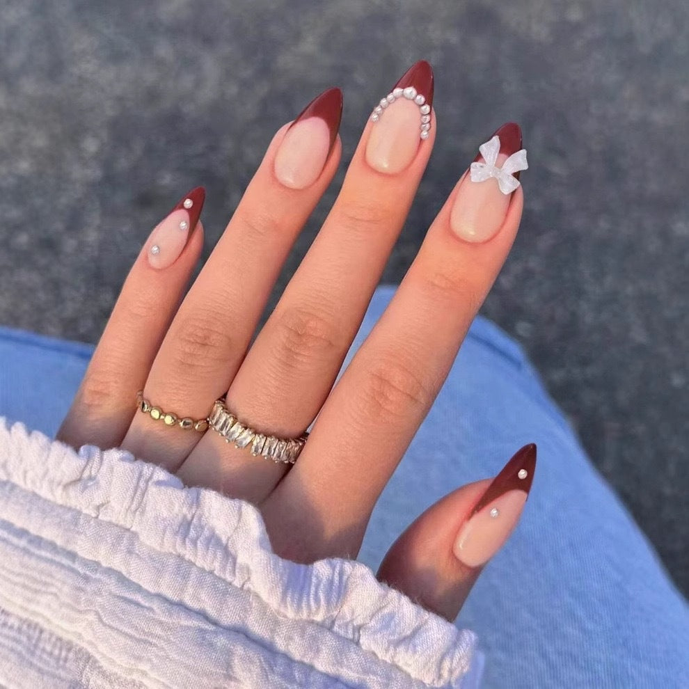 Artificial nail set with glamorous rhinestone and bow decorations Kalsten