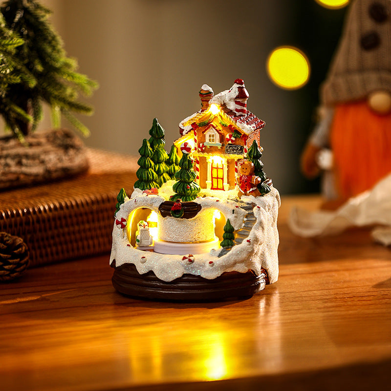 Illuminated Christmas village scene with winter design Kalsten