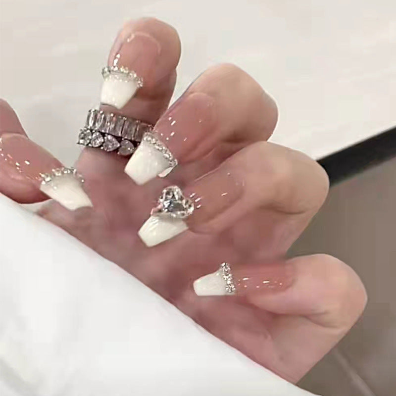 Glamorous artificial nails with rhinestones and elegant contours Kalsten