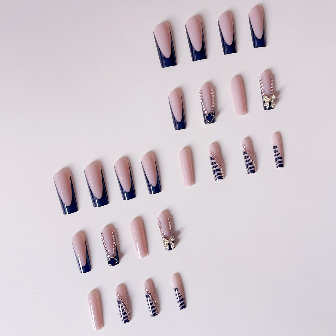 Glamorous artificial nails with elegant design with rhinestones and 3D decorations Kalsten
