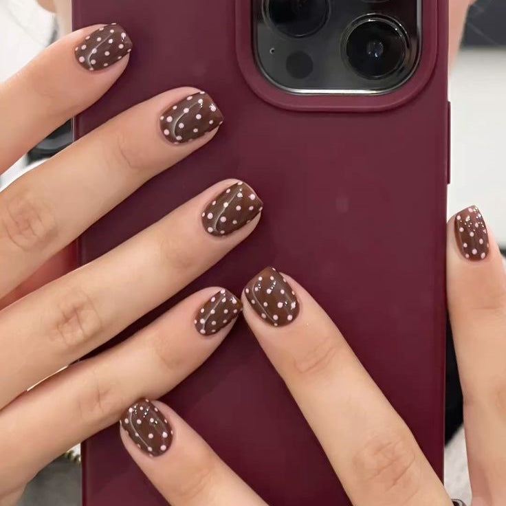 Acrylic nail set with stylish chocolate spots and elegant dots Kalsten