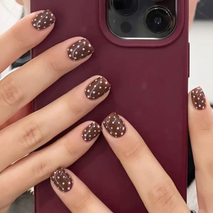 Acrylic nail set with stylish chocolate spots and elegant dots Kalsten