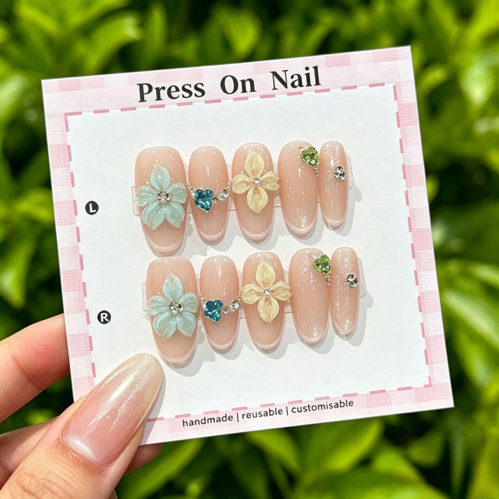 Artistic Press-On Nail Art Set with Cute Character and Bow Accents