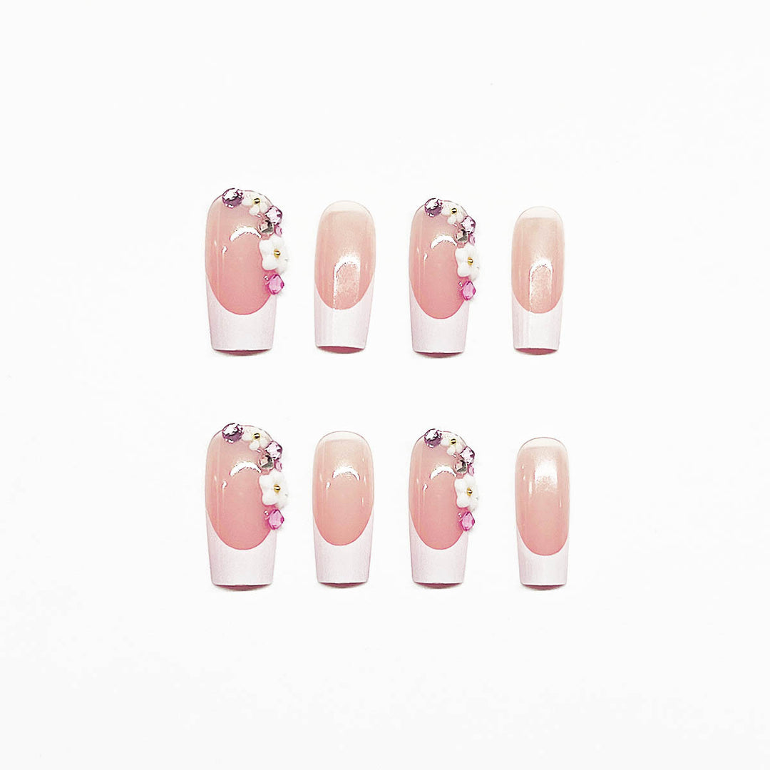 Artificial nail set with elegant floral decorations and transparent finish Kalsten