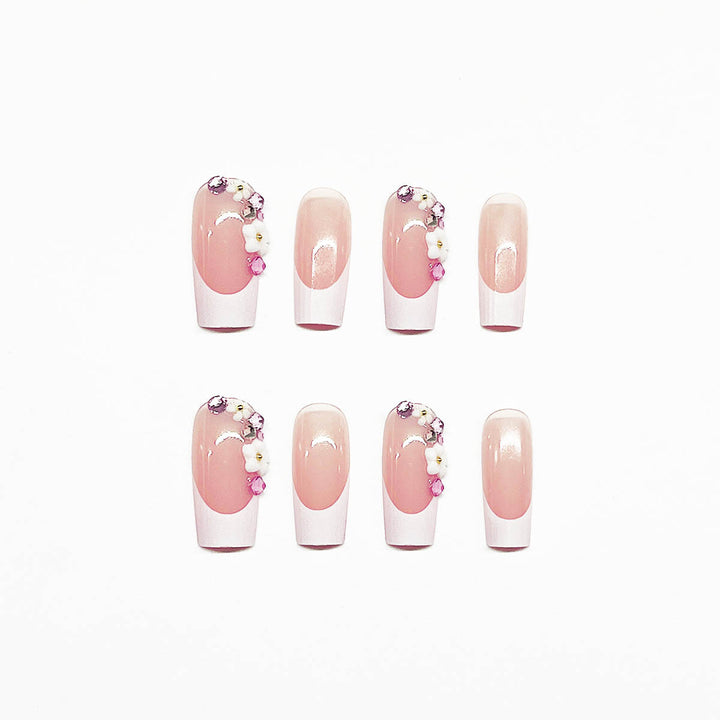 Artificial nail set with elegant floral decorations and transparent finish Kalsten