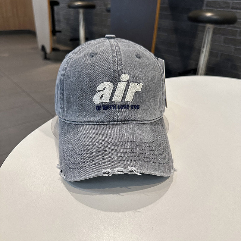 Distressed Denim Baseball Cap with Unique Embroidery