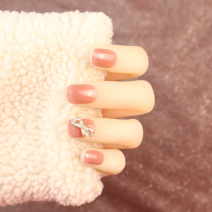 Elegant Press-On Nail Set with Rhinestone Bow