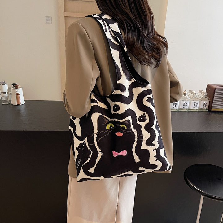 Shoulder bag with playful cat motif Kalsten