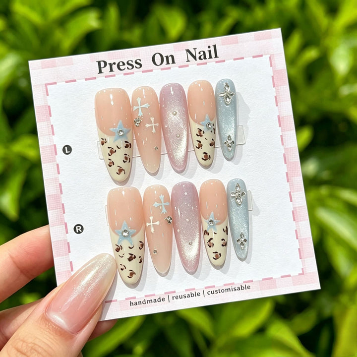 Artistic Press-On Nail Art Set with Cute Character and Bow Accents