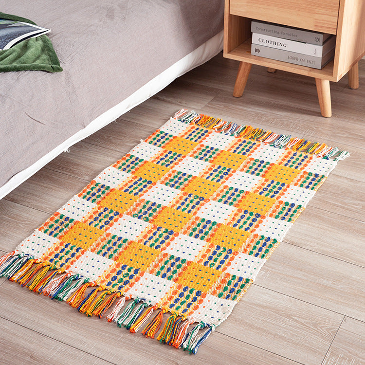 Striped cotton doormat with non-slip bottom and decorative woven edge Kalsten