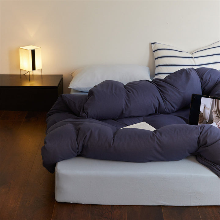 Bedding set made of cotton percale with striped pillowcase and smooth duvet cover