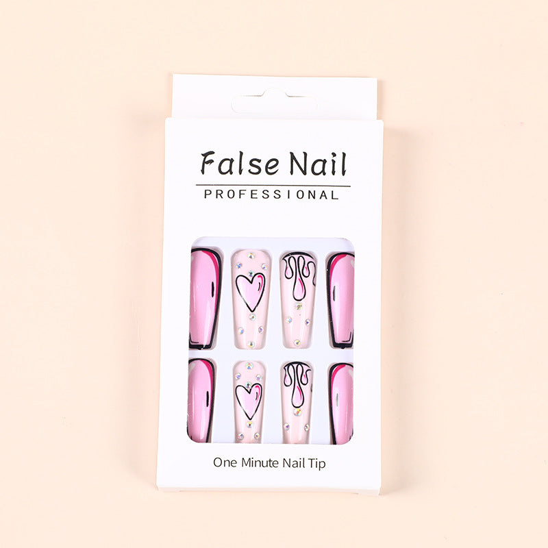 Eye-catching artificial nails with soulful heart design and glamorous accents Kalsten