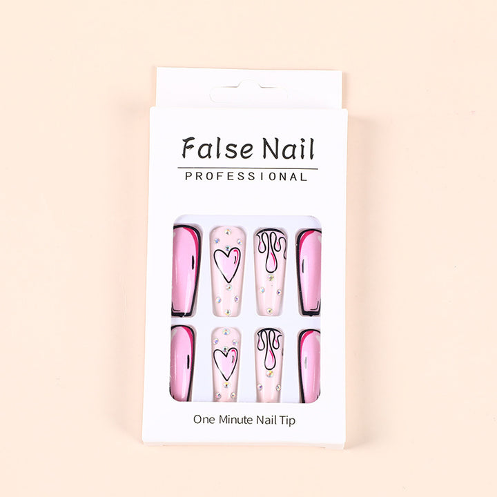 Eye-catching artificial nails with soulful heart design and glamorous accents Kalsten