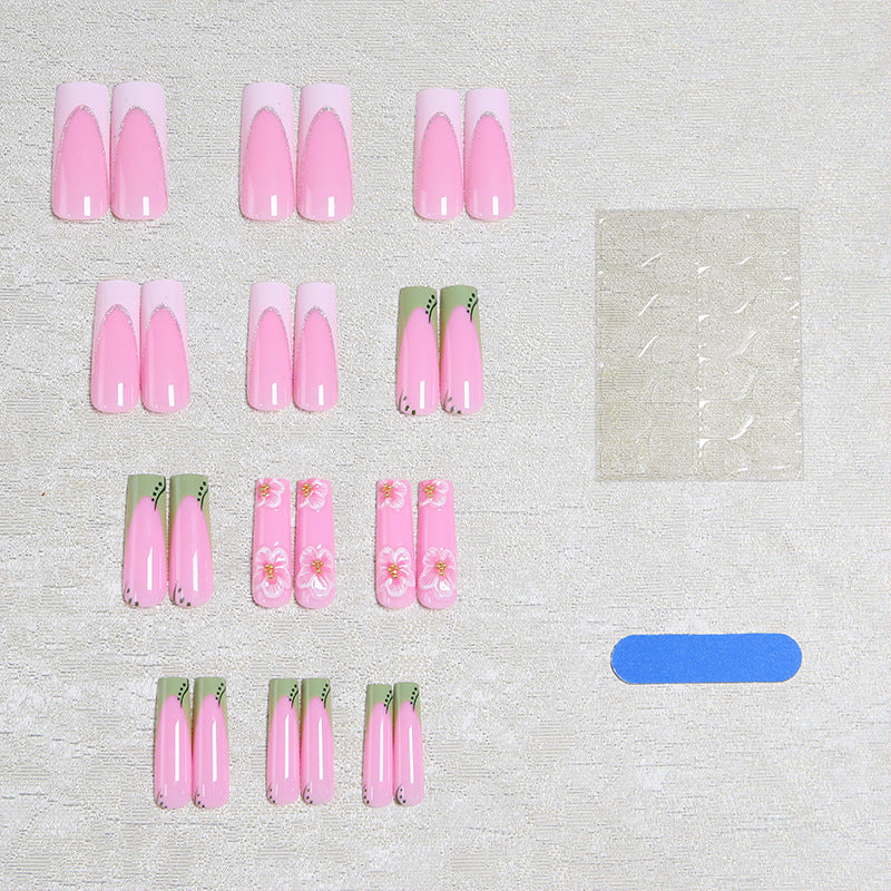 Artful nail tips with floral embellishments Kalsten