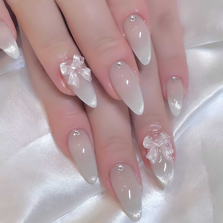 Elegant Stiletto-Shaped Press-On Nails with Decorative Bow Accents Kalsten