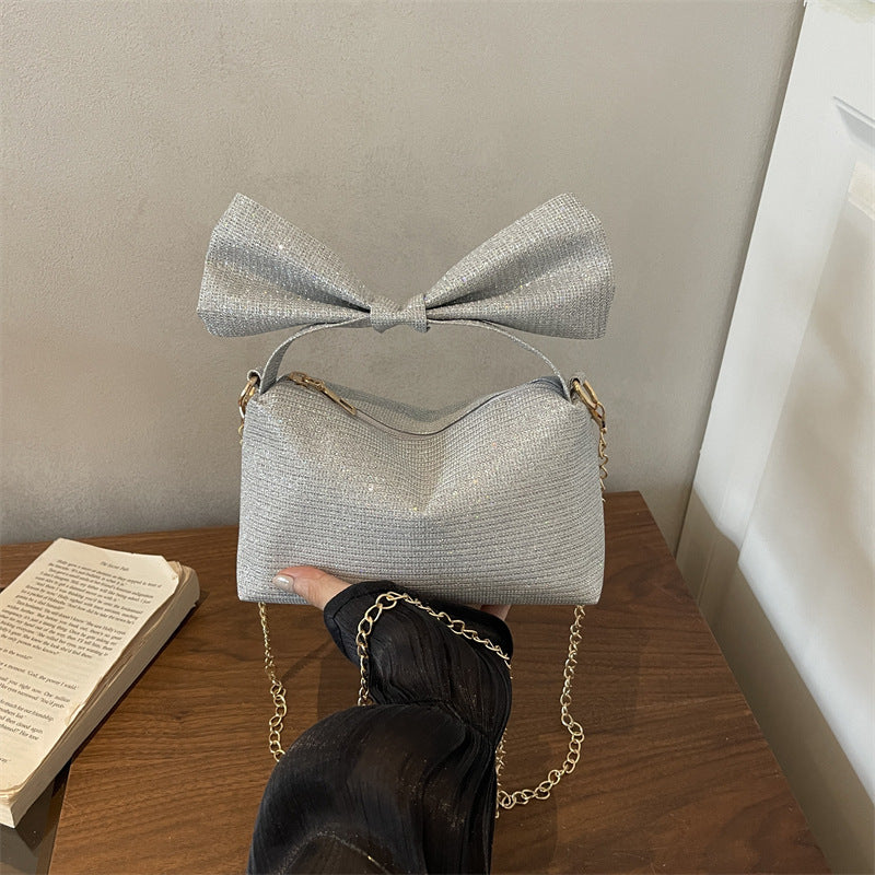 Bow-Accented Sparkling Handbag