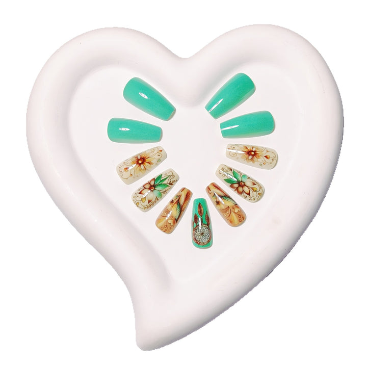 Creative artificial nails with floral and dreamcatcher design elements Kalsten